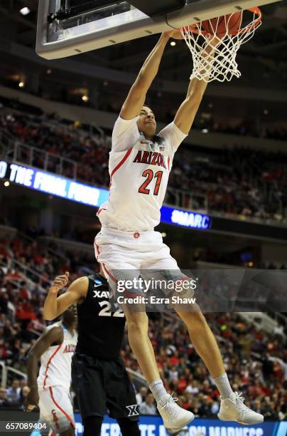 Chance Comanche of the Arizona Wildcats dunks in the first half against the Xavier Musketeers during the 2017 NCAA Men's Basketball Tournament West...