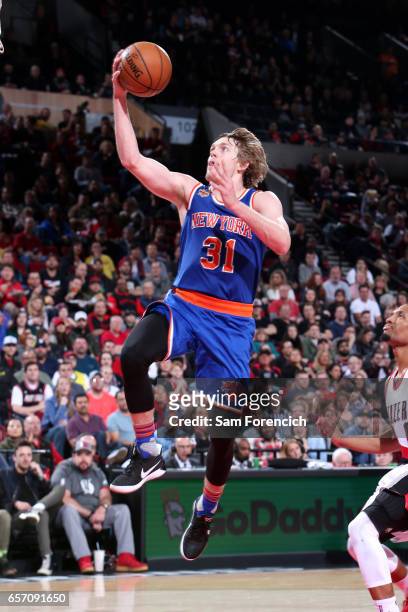 Ron Baker of the New York Knicks goes for a lay up during the game against the Portland Trail Blazers on March 23, 2017 at the Moda Center in...