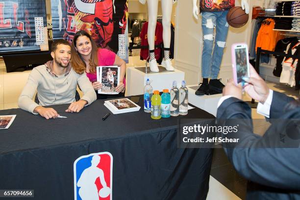 Michael Carter-Williams of the Chicago Bulls meets fans at the Forever 21 x NBA Collection Launch Party on March 23, 2017 in Chicago, Illinois.