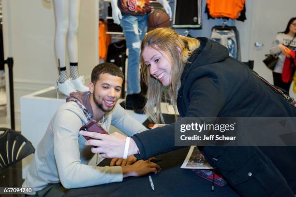 Michael Carter-Williams of the Chicago Bulls meets fans at the Forever 21 x NBA Collection Launch Party on March 23, 2017 in Chicago, Illinois.