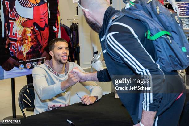 Michael Carter-Williams of the Chicago Bulls meets fans at the Forever 21 x NBA Collection Launch Party on March 23, 2017 in Chicago, Illinois.