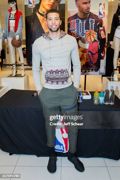 Michael Carter-Williams of the Chicago Bulls meets fans at the Forever 21 x NBA Collection Launch Party on March 23, 2017 in Chicago, Illinois.