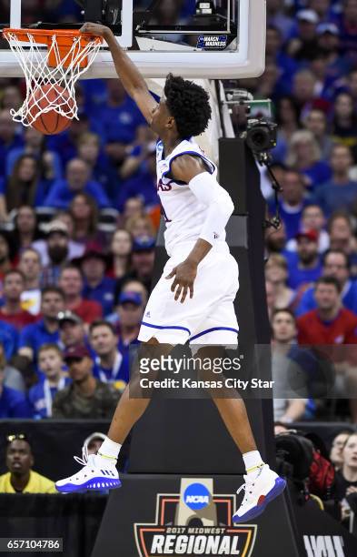 Kansas guard Josh Jackson dunks against Purdue Boilermakers in the first half during the Sweet Sixteen round of the NCAA Tournament at Sprint Center...