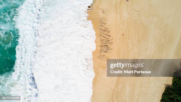 aerial vision, drone capture of the north shore oahu, hawaii. - breaking wave stock pictures, royalty-free photos & images