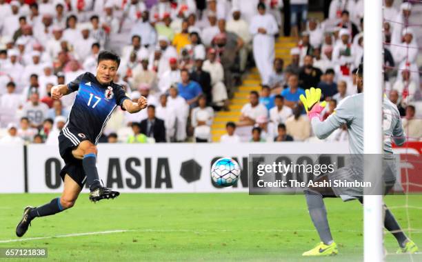 Yasuyuki Konno of Japan scores his side's second goal during the FIFA 2018 World Cup qualifying match between United Arab Emirates and Japan at Hazza...