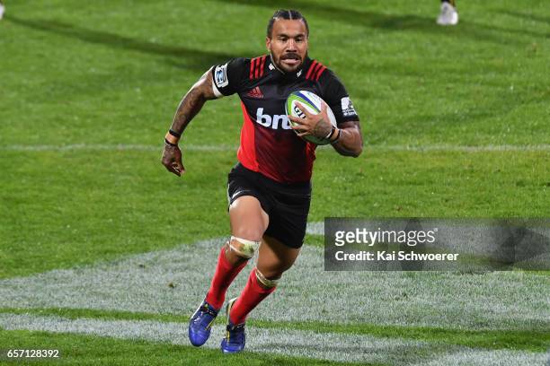 Digby Ioane of the Crusaders runs through to score a try during the round five Super Rugby match between the Crusaders and the Force at AMI Stadium...