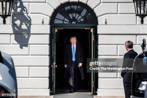 President Donald Trump walks out of the White House to meet truckers and CEOs regarding healthcare on the South Lawn of the White House in...