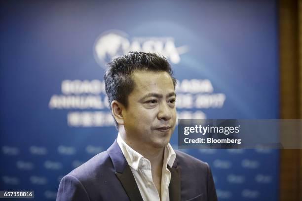 Wang Zhonglei, vice chairman, president and co-founder of Huayi Brothers Media Corp., pauses during an interview on the sidelines of the Boao Forum...