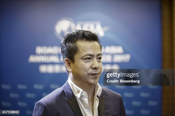Wang Zhonglei, vice chairman, president and co-founder of Huayi Brothers Media Corp., pauses during an interview on the sidelines of the Boao Forum...