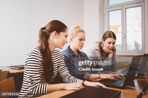 Computing Lab Female Student Female Students In Computer Lab Working On Laptop High-Res Stock Photo ...