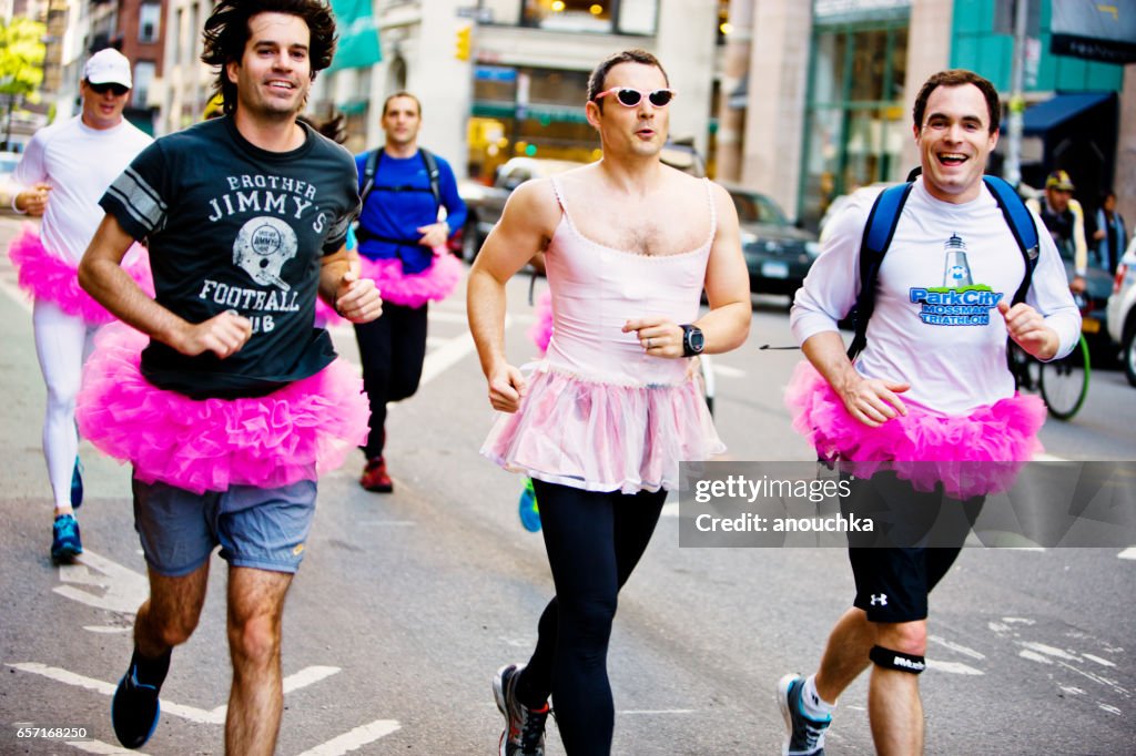 Cross Dressed Men running in New York