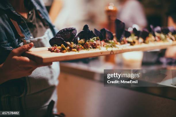 caterer cooking - tapas stock pictures, royalty-free photos & images