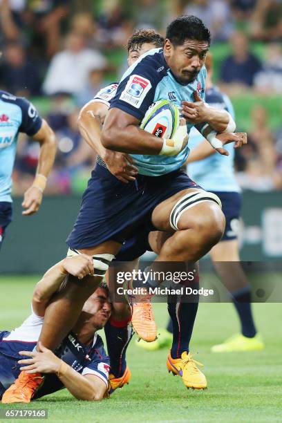 Will Skelton of the Waratahs tries to break his way through during the round five Super Rugby match between the Rebels and the Waratahs at AAMI Park...