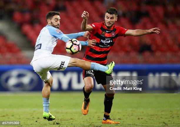 Anthony Caceres of Melbourne City is challenged by Terry Antonis of the Wanderers during the round 24 A-League match between the Western Sydney...
