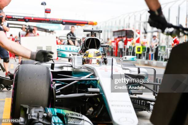 Lewis Hamilton of the United Kingdom driving for Mercedes AMG Petronas enters pit lane on Friday Free Practice during the 2017 Rolex Australian...