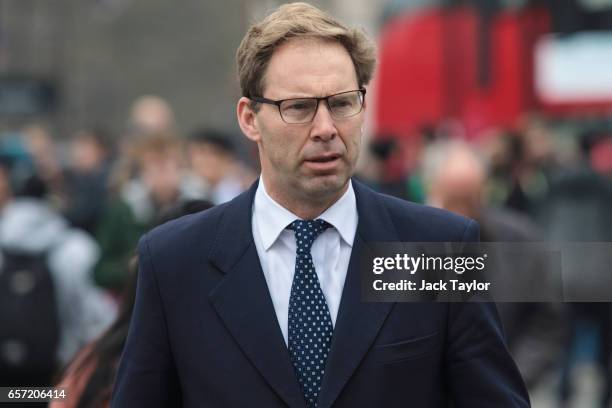 Conservative MP Tobias Ellwood walks towards the Houses of Parliament on March 24, 2017 in London, England. Mr Ellwood was pictured giving first aid...