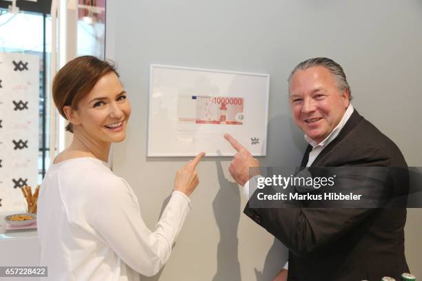 Judith Dommermuth and Manuel Rivera pose during the Different Fashion store opening on March 23, 2017 in Hamburg, Germany.