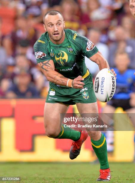 Josh Hodgson of the Raiders passes the ball during the round four NRL match between the Brisbane Broncos and the Canberra Raiders at Suncorp Stadium...