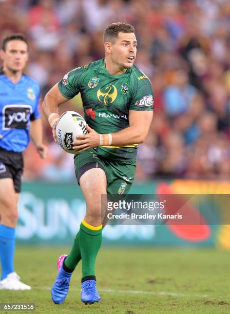 Aidan Sezer of the Raiders looks to pass during the round four NRL match between the Brisbane Broncos and the Canberra Raiders at Suncorp Stadium on...