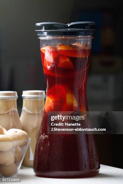 homemade sangria on dark background - nanette j stevenson stock pictures, royalty-free photos & images