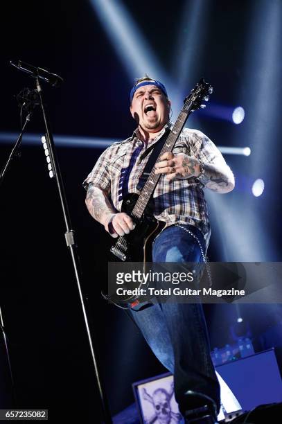 Guitarist and vocalist Chris Robertson of American hard rock group Black Stone Cherry performing live on stage at the Motorpoint Arena in Nottingham,...