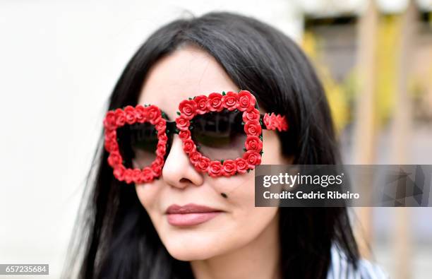 Guest, sunglasses detail, attends Fashion Forward March 2017 held at the Dubai Design District on March 24, 2017 in Dubai, United Arab Emirates.