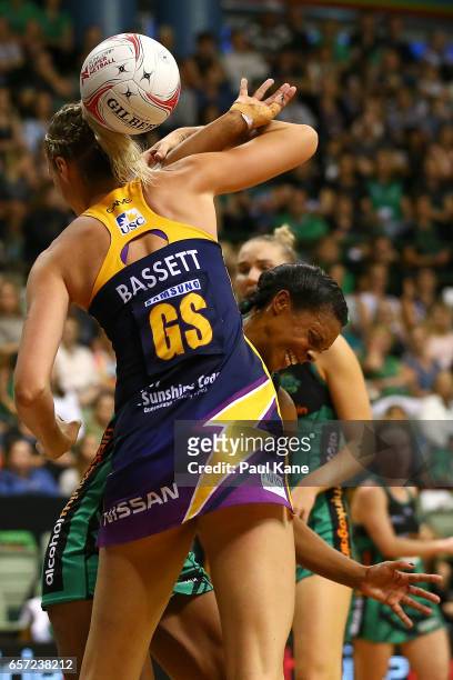 Caitlin Bassett of the Lightning and Stacey Francis of the Fever contest for the ball during the round six Super Netball match between the Fever and...