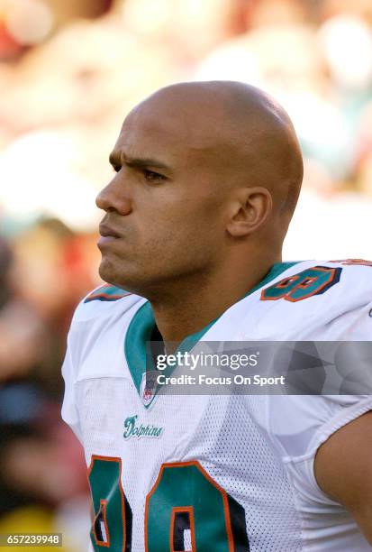 Jason Taylor of the Miami Dolphins looks on against the San Francisco 49ers during an NFL football game November 28, 2004 at Candlestick Park in San...
