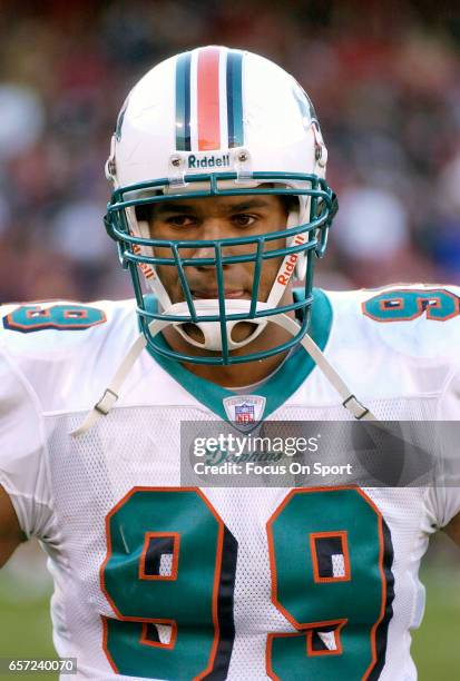 Jason Taylor of the Miami Dolphins looks on against the San Francisco 49ers during an NFL football game November 28, 2004 at Candlestick Park in San...