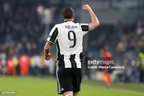 Gonzalo Higuain of Juventus celebrates after scoring the opening goal during the UEFA Champions League Group H match between Juventus and GNK Dinamo...
