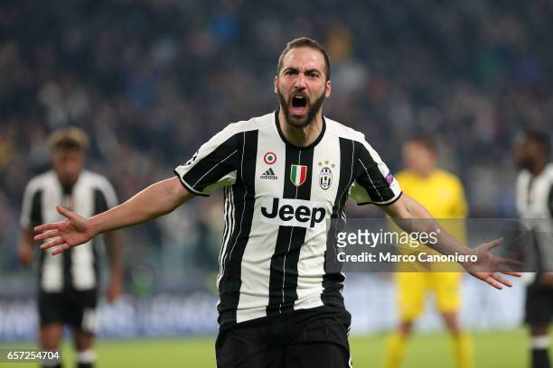 Gonzalo Higuain of Juventus celebrates after scoring the opening goal during the UEFA Champions League Group H match between Juventus and GNK Dinamo...