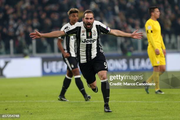 Gonzalo Higuain of Juventus celebrates after scoring the opening goal during the UEFA Champions League Group H match between Juventus and GNK Dinamo...