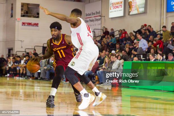 John Holland of the Canton Charge dribbles the ball against Demetrius Jackson of the Maine Red Claws on March 23, 2017 at the Portland Expo in...