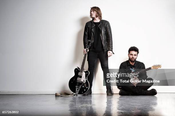 Portrait of musicians Joe Langridge-Brown and Dominic Craik, guitarists with English alternative rock group Nothing But Thieves photographed before a...