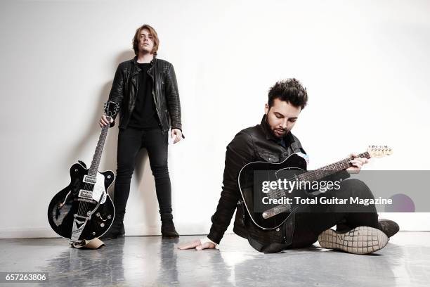 Portrait of musicians Joe Langridge-Brown and Dominic Craik, guitarists with English alternative rock group Nothing But Thieves photographed before a...