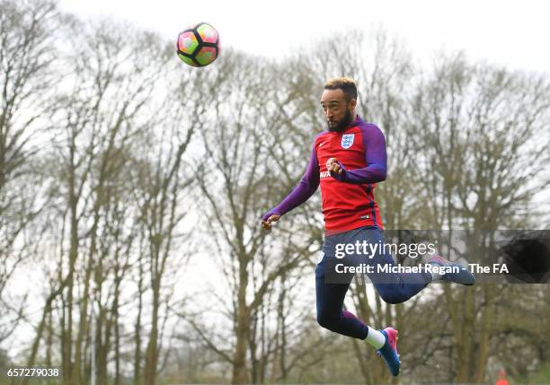 Nathan Redmond heads the ball during the England Training Session at The Grove Hotel on March 24, 2017 in Hertford, England.