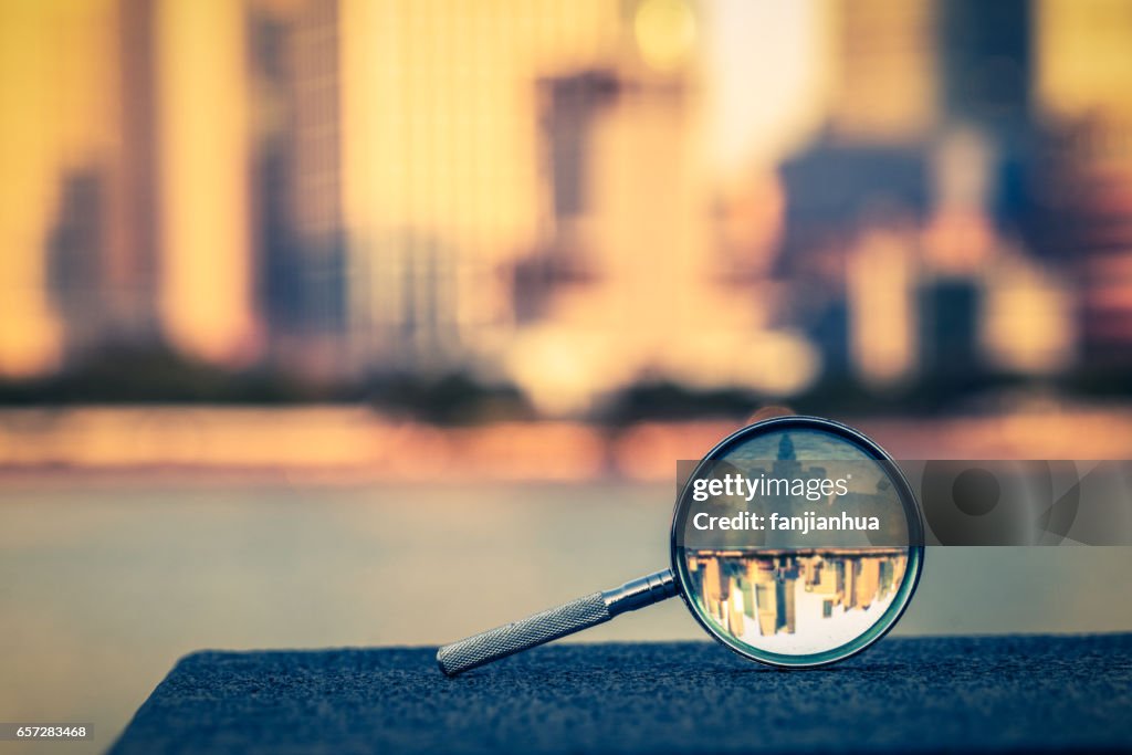 The bund of Shanghai reflected in a magnifying glass
