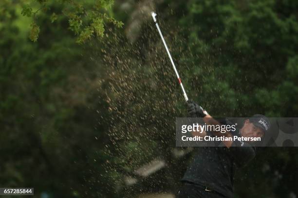 Phil Mickelson plays a shot out of a bunker on the 6th hole of his match during round three of the World Golf Championships-Dell Technologies Match...