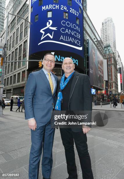 Vice President of NASDAQ, Joseph Brantuk, Carmen Marc Valvo, fashion designer along with the Colon Cancer Alliance ring the Nasdaq Stock Market...