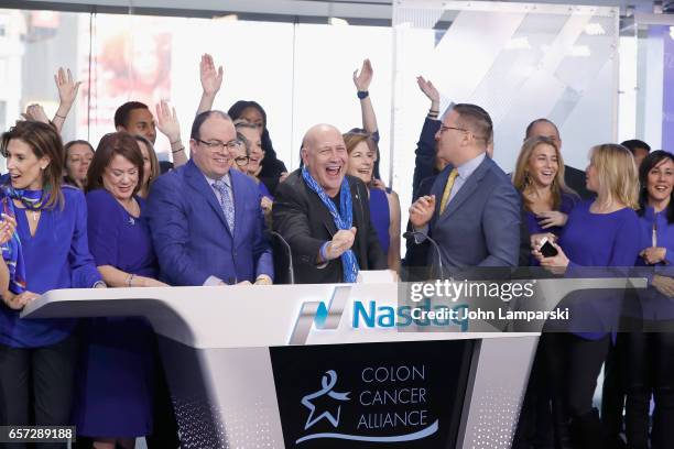 Michael Sapienza, Carmen Marc Valvo, fashion designer, Vice President of NASDAQ, Joseph Brantuk along with the Colon Cancer Alliance ring the Nasdaq...