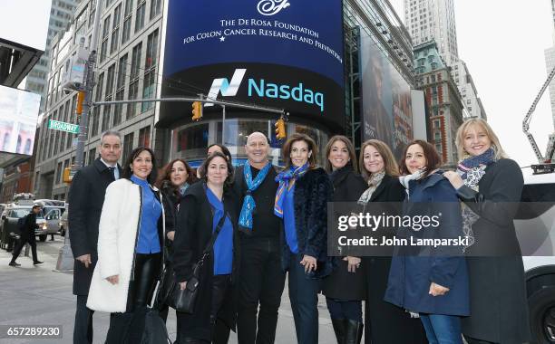 Carmen Marc Valvo, fashion designer along with the De Rosa Foundation ring the Nasdaq Stock Market opening bell at NASDAQ MarketSite on March 24,...