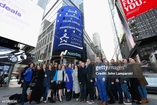 Michael Sapienza, Carmen Marc Valvo, fashion designer, Vice President of NASDAQ, Joseph Brantuk along with the Colon Cancer Alliance ring the Nasdaq...