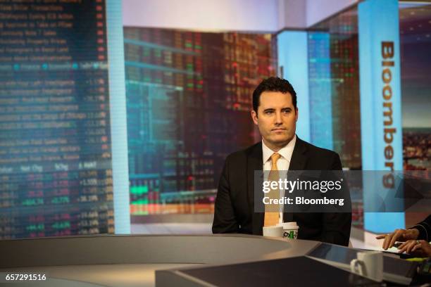 Jim Keenan, head of global credit of BlackRock Financial Management Inc., listens during a Bloomberg Television interview in New York, U.S., on...