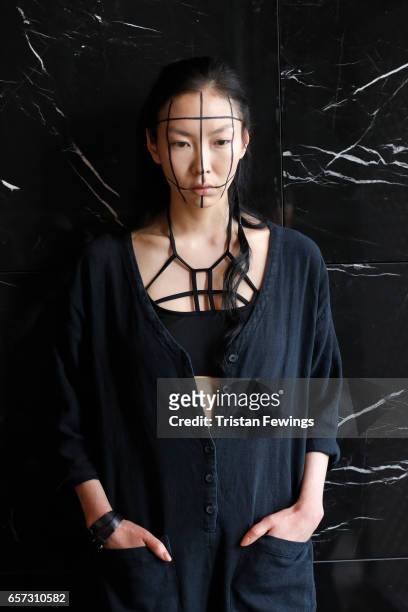 Model poses backstage ahead of the Murat Aytulum show during Mercedes-Benz Istanbul Fashion Week March 2017 at Grand Pera on March 24, 2017 in...
