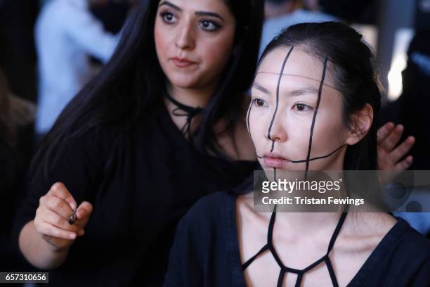 Model being styled backstage ahead of the Murat Aytulum show during Mercedes-Benz Istanbul Fashion Week March 2017 at Grand Pera on March 24, 2017 in...