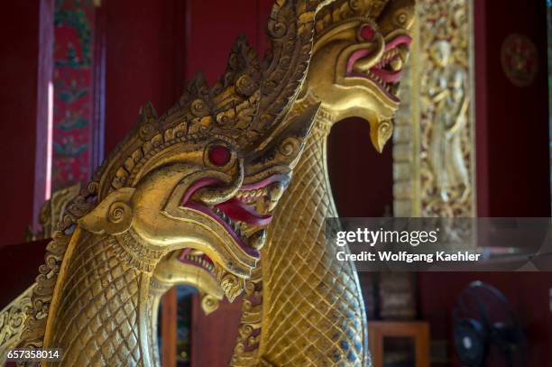 The Chariot Hall or Royal Funerary Chariot Hall at the Wat Xieng Thong in the UNESCO world heritage town of Luang Prabang in Central Laos contains...