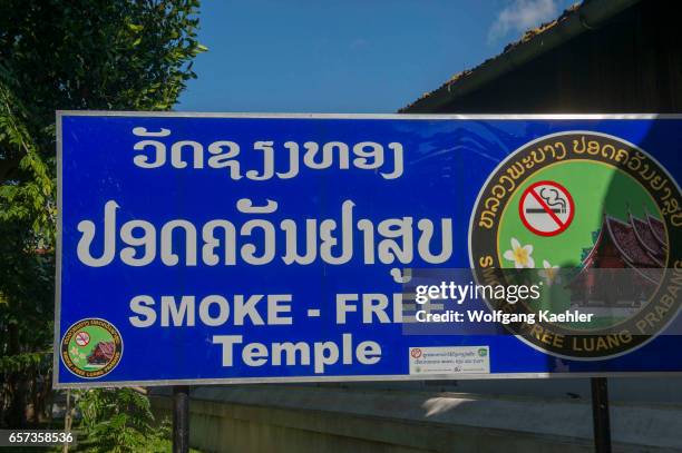 Smoke free sign at the Wat Xieng Thong built by King Setthathirath in 1559 in the UNESCO world heritage town of Luang Prabang in Central Laos.