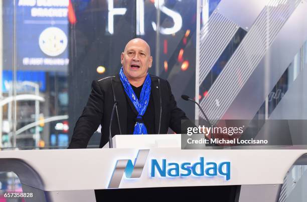 Fashion designer Carmen Marc Valvo and The Colon Cancer Alliance ring the Nasdaq Stock Market Opening Bell at NASDAQ on March 24, 2017 in New York...