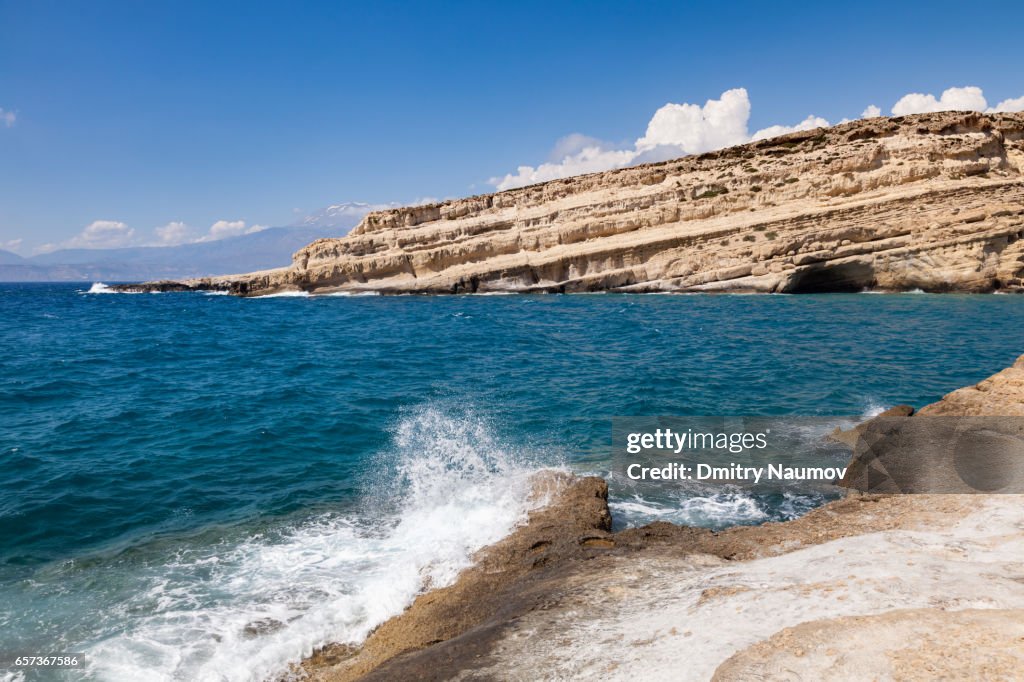 Wave crashing on rock at Matala beach, Heraklion, Crete,  Greece, Mediterranean