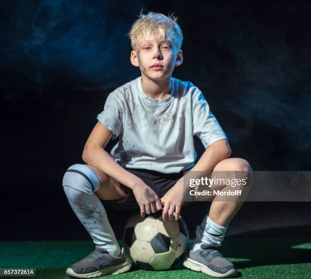 portrait of little footballer - soccer player full body stock pictures, royalty-free photos & images